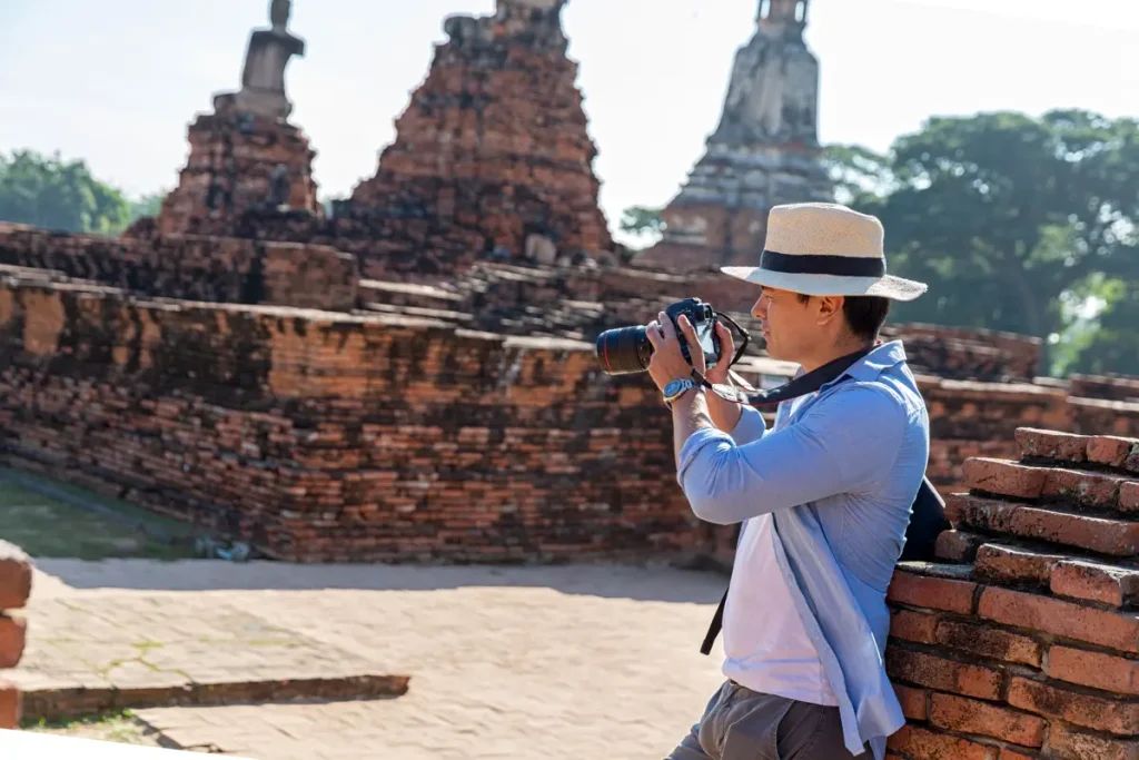 man photographing cambogia - slowfoto